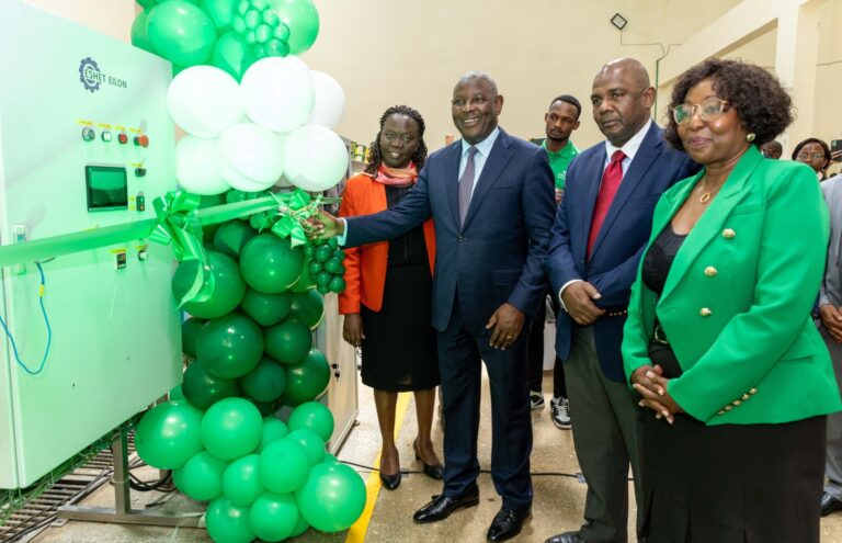 Equity Group Managing Director and CEO Dr James Mwangi (2 nd left) cut the ribbon to signify the commissioning of the packing machine. Looking on are (l-r) Director at Horticultural Crops Directorate Dr Christine Chesaro, Karakuta Chairman Mtalaki Mwashimba and Karakuta CEO Grace Ngungi.